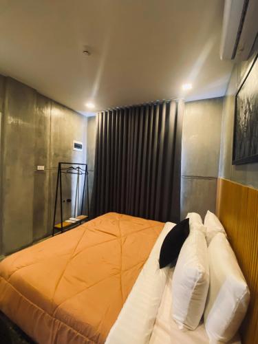 Ένα ή περισσότερα κρεβάτια σε δωμάτιο στο 518Hotel