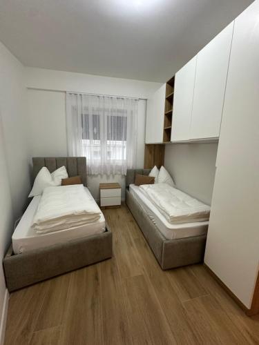 Postel nebo postele na pokoji v ubytování Villa Hajdi Q & U