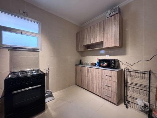 Kuchyň nebo kuchyňský kout v ubytování Dream Apartment in Cairo I Spacious & Sophisticate