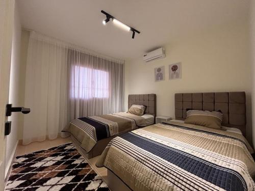 Postel nebo postele na pokoji v ubytování Dream Apartment in Cairo I Spacious & Sophisticate