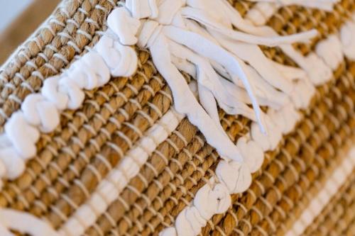 a wicker basket with white icing on it at Blue Sea Suites in Afitos