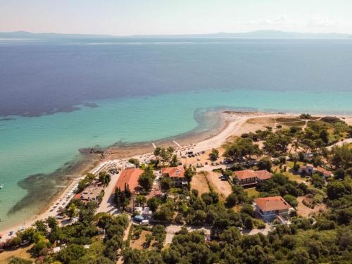 an aerial view of a resort on a beach at Blue Sea Suites in Afitos
