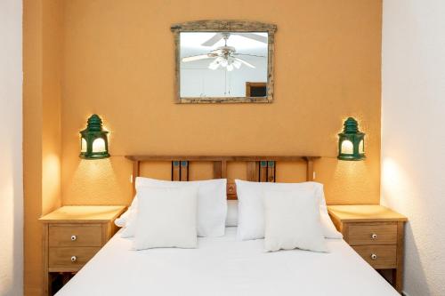 Posteľ alebo postele v izbe v ubytovaní Frente a la Alhambra