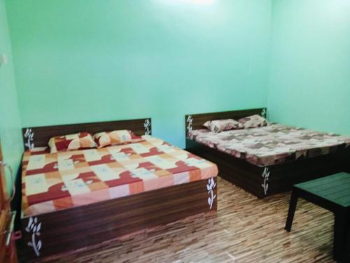Kartik home stayにあるベッド