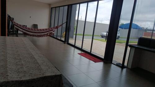 Ένα ή περισσότερα κρεβάτια σε δωμάτιο στο Área de lazer Recanto Feliz