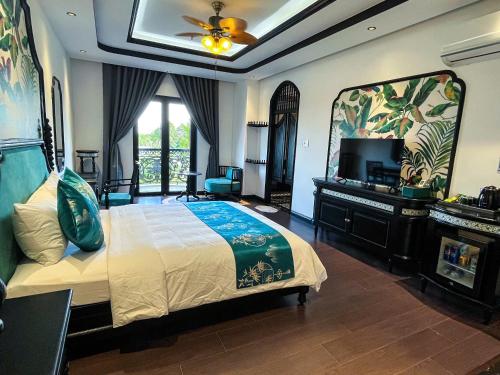 Voodi või voodid majutusasutuse MAISON CAMELLIA Hotel toas