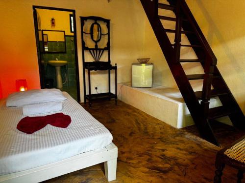 Postel nebo postele na pokoji v ubytování GRECHA Hotel