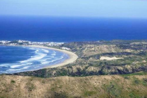 an aerial view of a beach and the ocean at Jubilee in Buffelsbaai