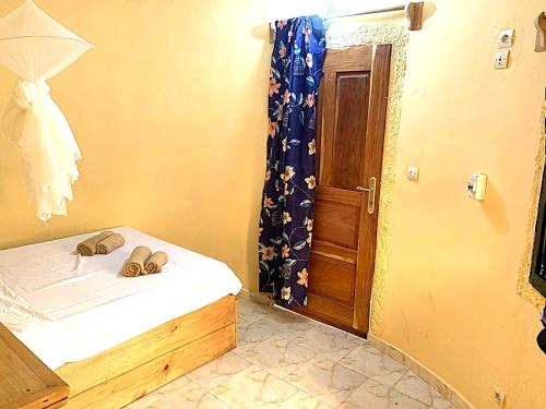 Una cama o camas en una habitación de BallaSte