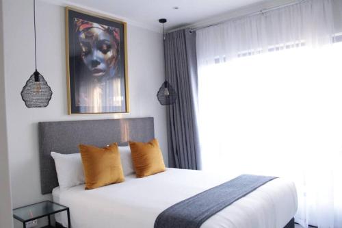 Katil atau katil-katil dalam bilik di Stunning 2 bed Apartment near Monte Casino