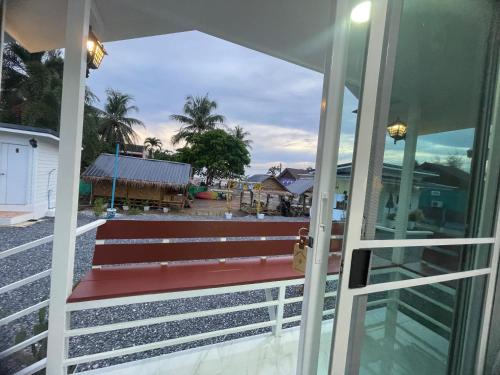 a view from the door of a house at The White House Pakbara in Ban Pak Ba Ra