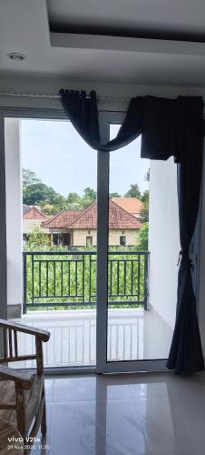 Balkón nebo terasa v ubytování Lumbung Sari Home Stay