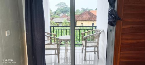 Balkón nebo terasa v ubytování Lumbung Sari Home Stay