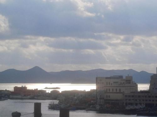 a view of a city and a body of water at Heimish Hotel in Tongyeong