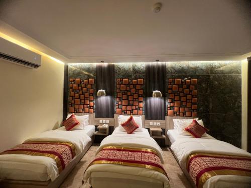 Postel nebo postele na pokoji v ubytování P Quattro Relax Hotel