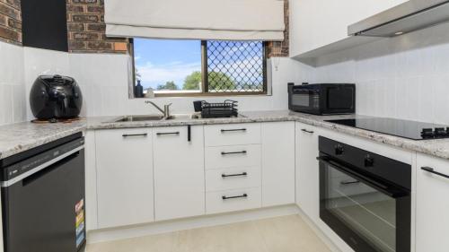Dapur atau dapur kecil di Sheridan By The Seashore