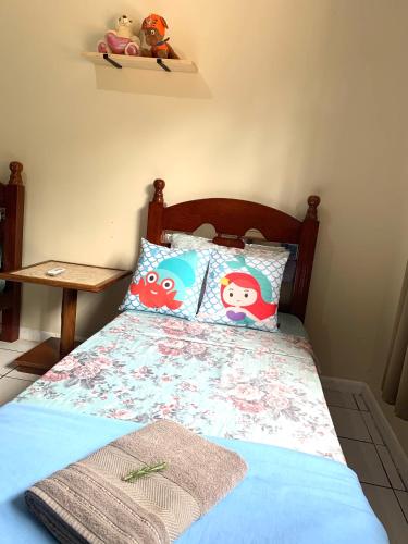 Letto o letti in una camera di Casa Nina, com Piscina e Brinquedoteca, Super Próxima das Cataratas e Aeroporto