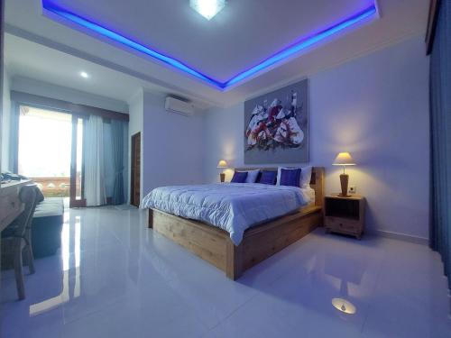 Katil atau katil-katil dalam bilik di GJ Guest House Sidemen