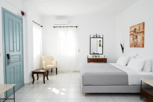 Asterias Boutique Hotelにあるベッド