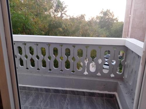 a balcony with a bunch of spoons on it at Pride Studio II in Mombasa