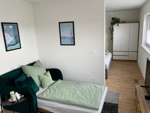 Postel nebo postele na pokoji v ubytování Ferienwohnung Mucki