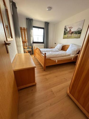 Postel nebo postele na pokoji v ubytování Panoramablick