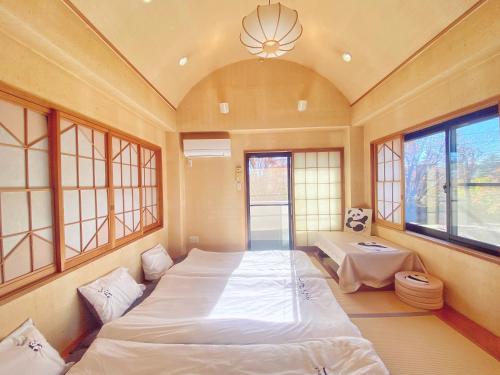 東京にある民宿初星の窓付きの部屋(ベッド2台付)