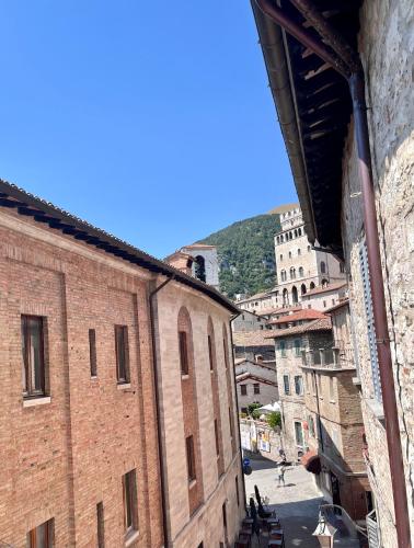 a view of an alley from a building at L'Inferno di Dante in Gubbio