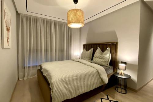 Ένα ή περισσότερα κρεβάτια σε δωμάτιο στο Appartement en résidence Malabata Hills