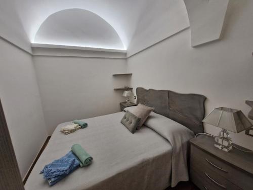 Una cama o camas en una habitación de Le tre anfore