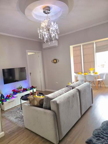 TV a/nebo společenská místnost v ubytování Siart Apartment