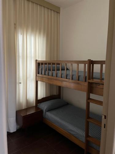 Llit o llits en una habitació de Edificio Valle