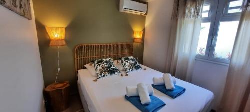 เตียงในห้องที่ Libre Lune