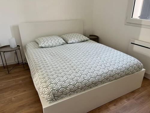 Postel nebo postele na pokoji v ubytování Maison proche Châtelaillon-plage
