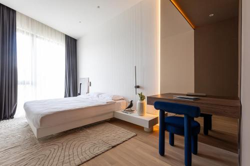 Katil atau katil-katil dalam bilik di Cosy Easy Apartment