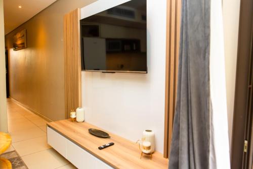 TV a/nebo společenská místnost v ubytování Zimbali Suites 320