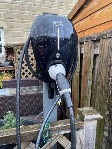 a hair dryer is attached to a wooden fence at Rosemary cottage -Your Cozy Countryside Escape, Matlock in Matlock