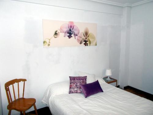 מיטה או מיטות בחדר ב-Casa Haro
