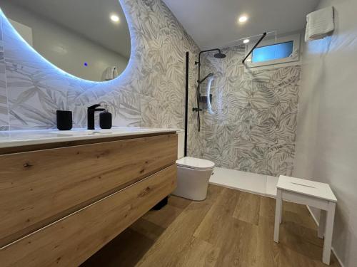 Ένα μπάνιο στο Apartamentos Villacarriedo