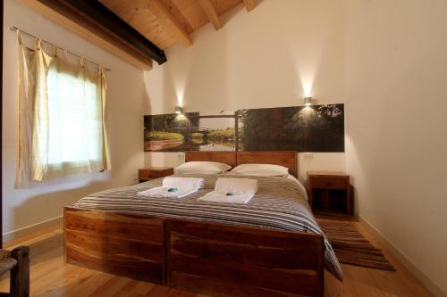 Posteľ alebo postele v izbe v ubytovaní Agriturismo Richeton