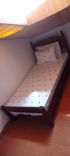 a bunk bed with two pillows on it in a room at Serena beach villas in Mombasa