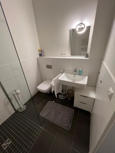 Ένα μπάνιο στο Barrierefreie Erdgeschossferienwohnung Lübeck