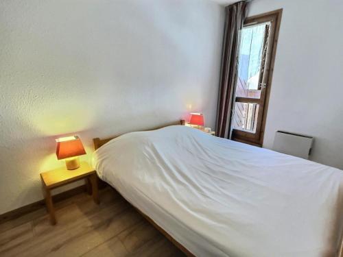 Posteľ alebo postele v izbe v ubytovaní Résidence Hameaux De Val - Votre grand studio mezzanine avec garage couvert à 5 min des pistes MAE-1004
