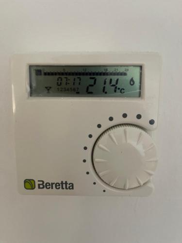 a machine with a speedometer and a clock on it at Deluxe two bedroom apartment with elevator in Ez Zahra