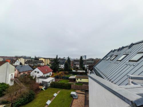 a view of a city from the roof of a building at Stilvolle Maisonette Wohnung in Karlsruhe