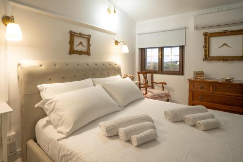 Postel nebo postele na pokoji v ubytování Maison Noisette