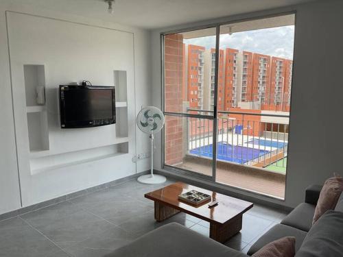 Sjónvarps- og/eða afþreyingartæki á Excelente Apartamento Familiar en Sector Residencial