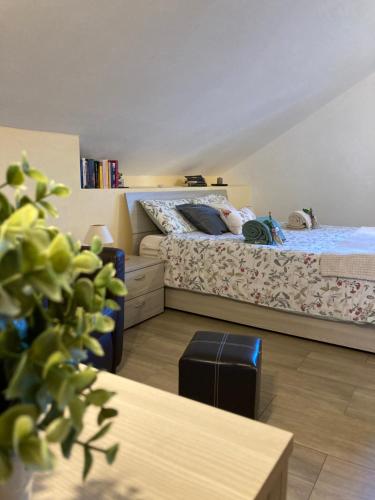 a room with two twin beds and a table at Calisio, Trentino in Civezzano