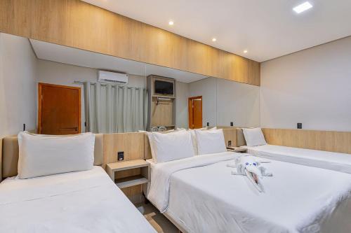 Ein Bett oder Betten in einem Zimmer der Unterkunft Pousada Villas - Bonito