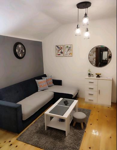 Zona d'estar a Kum Apartment
